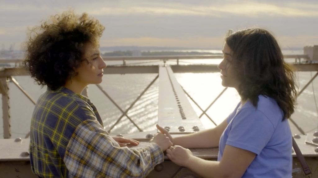 Ilana and Abbi hold hands on Brooklyn Bridge