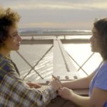 Ilana and Abbi hold hands on Brooklyn Bridge