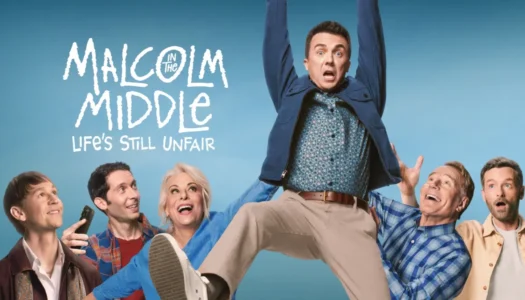 Poster-style image of six adults lifting a man in a blue jacket against a blue sky, with the title 'Malcolm in the Middle: Life's Still Unfair' on the left.