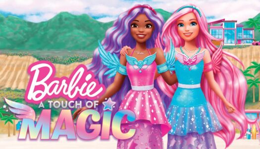 Barbie-style dolls in pink and blue outfits standing arm in arm on a sunny beach with mountains in the background and a colorful building behind them, promoting 'Barbie: A Touch of Magic'.